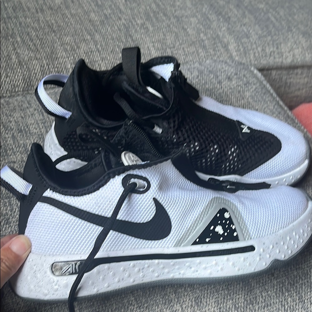 Nike Black and White Slip-On Sneakers